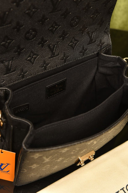 Metis Pochette Black Bag
